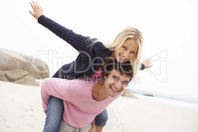 Man Giving Woman Piggyback