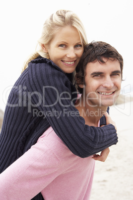 Man Giving Woman Piggyback