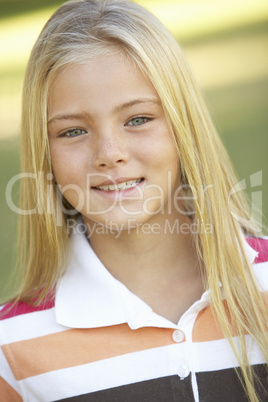 Portrait Of Young Girl In Park