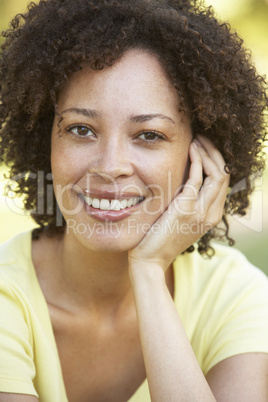 Portrait Of Young Woman In Park