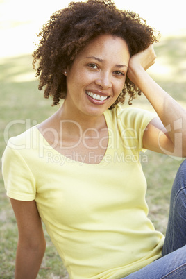 Portrait Of Young Woman In Park