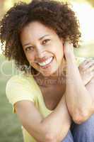 Portrait Of Young Woman In Park