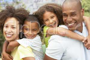 Portrait of Happy Family In Park