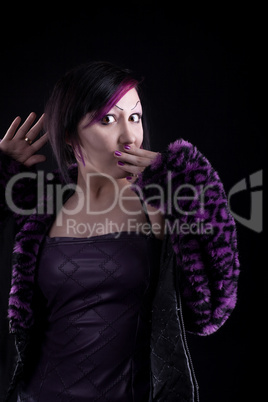 Young girl in purple fur confused look at you