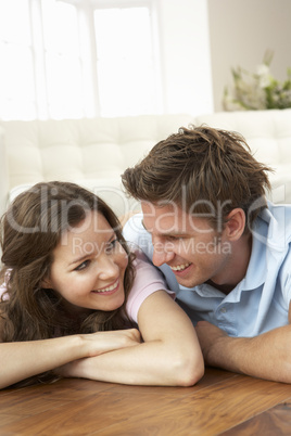 Affectionate Couple Relaxing At Home Together