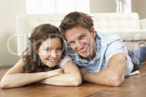 Affectionate Couple Relaxing At Home Together