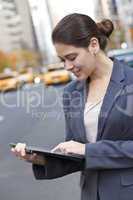 Young Woman Using Tablet Computer in New York City