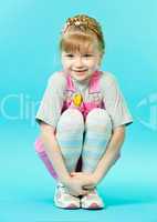 A girl sitting squatted
