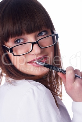 Girl biting pen