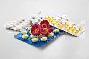 Tablets and capsules with daisies