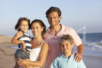 Portrait Of Family On Beach Holiday