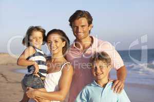 Portrait Of Family On Beach Holiday