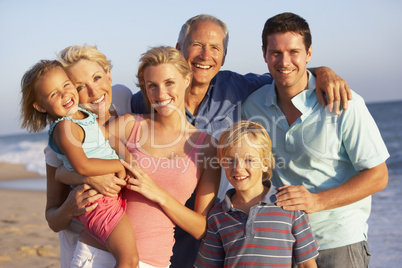Portrait Of Three Generation Family On Beach Holiday