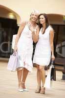 Senior Mother And Daughter Enjoying Shopping Trip Together