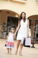 Mother And Daughter Enjoying Shopping Trip Together