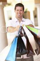 Young Man Enjoying Shopping Trip