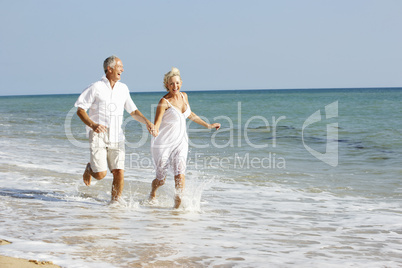 Senior Couple Enjoying Beach Holiday