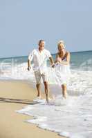 Senior Couple Enjoying Beach Holiday