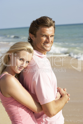 Young Couple Enjoying Beach Holiday