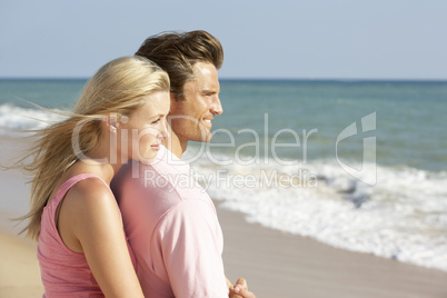 Young Couple Enjoying Beach Holiday