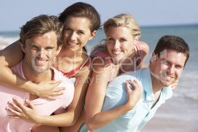 Group Of Friends Enjoying Beach Holiday