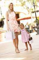 Mother And Daughter Enjoying Shopping Trip Together