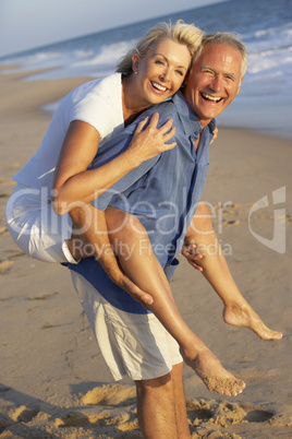 Senior Couple Enjoying Beach Holiday