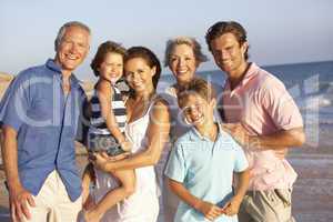 Portrait Of Three Generation Family On Beach Holiday