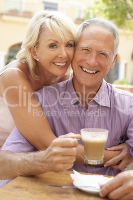 Senior Couple Enjoying Coffee And Cake In Caf?