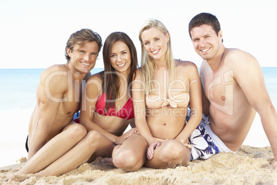 Group Of Friends Enjoying Beach Holiday