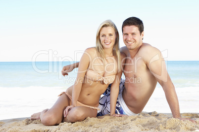 Young Couple Enjoying Beach Holiday