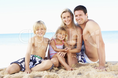 Portrait Of Family On Summer Beach Holiday