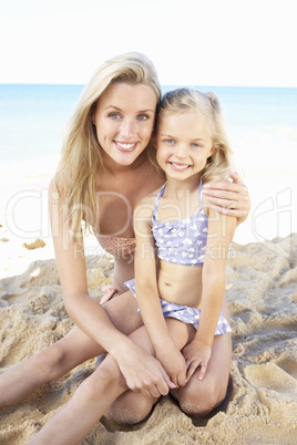 Portrait Of Mother And Daughter On Summer Beach Holiday