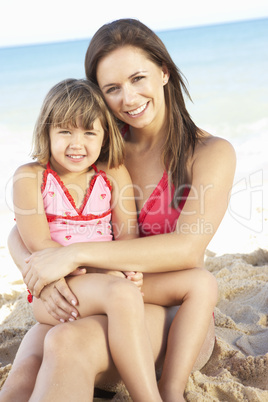 Portrait Of Mother And Daughter On Summer Beach Holiday