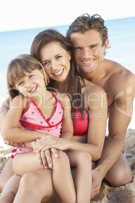 Portrait Of Family On Summer Beach Holiday