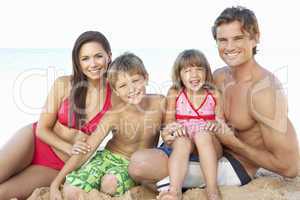 Portrait Of Family On Summer Beach Holiday