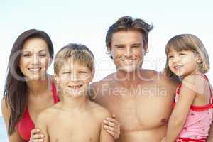 Portrait Of Family On Summer Beach Holiday