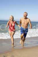 Senior Couple Enjoying Beach Holiday