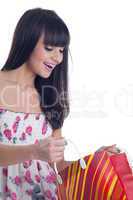 Young girl look in bag and smile