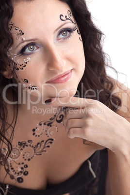 Woman face with paint close-up portrait