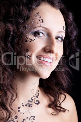 Woman face with paint close-up portrait