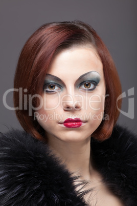 Woman portrait with fur boa in retro style