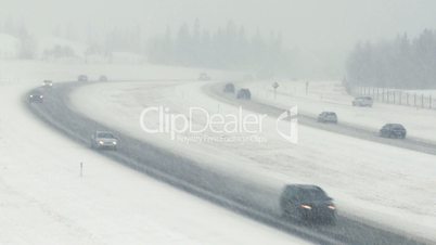Snow storm highway traffic
