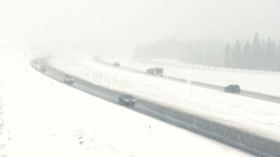 Snow storm highway traffic