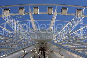 Large ferris wheel against clear bly sky