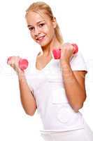 pink dumbbells in the hands of women