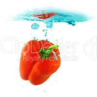 sweet pepper falling into the water