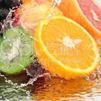 fruit in a spray of water