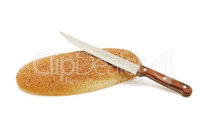 Fresh bread and kitchen knife