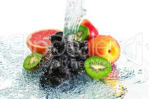 fruit in a spray of water